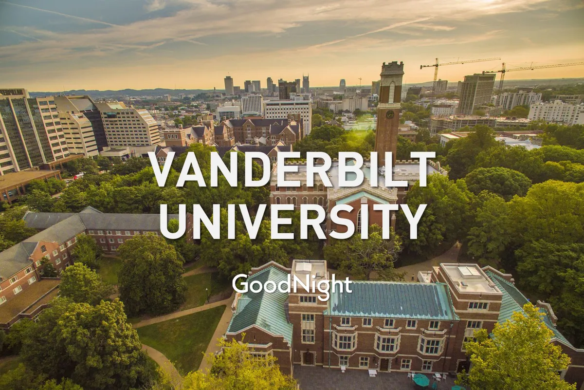 A panoramic view of Vanderbilt University's iconic clock tower, framed by green trees and set against the backdrop of Nashville's downtown skyline. The scene exudes an inspiring, collegiate energy.