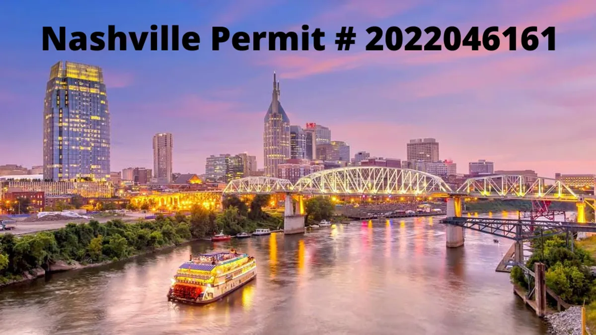 A sweeping riverfront view with the Nashville skyline aglow, bridges lit up, and a riverboat cruising beneath the city lights. The image exudes energy and possibility, showcasing the area’s blend of historic charm and modern nightlife.